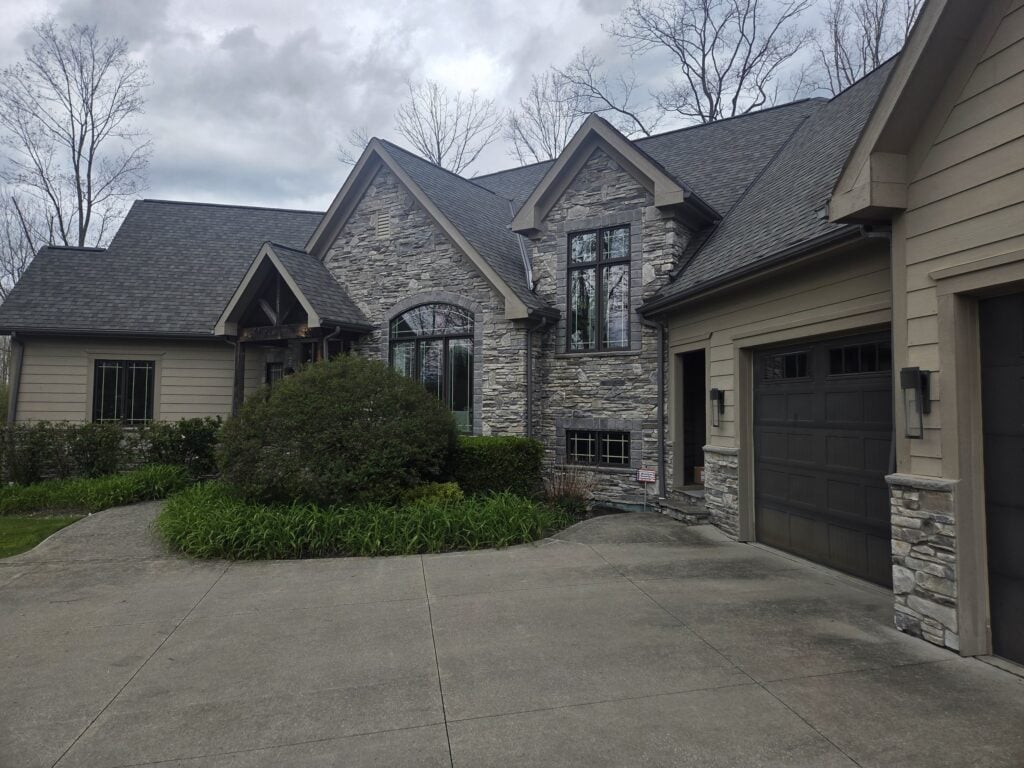 New roof and gutters on a stone and shake home in Chagrin Falls, OH, by MacGregor Roofing