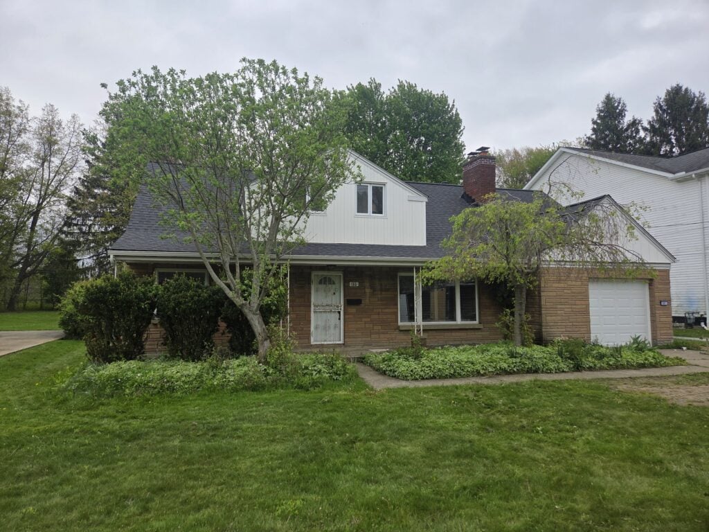 New roof on a brick Cape Cod home in Mayfield Heights, OH, by MacGregor Roofing